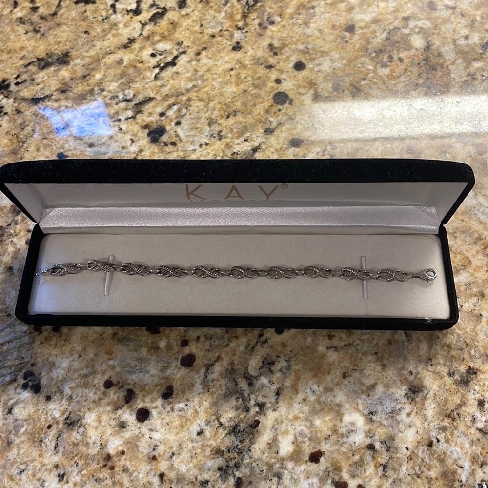 Kay Jewelers sterling silver infinity bracelet with accent diamonds